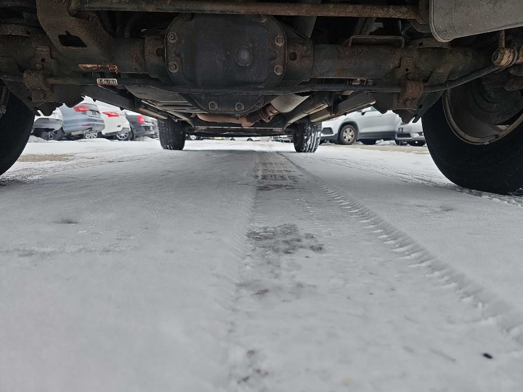 RAM 1500 4WD Quad Cab 140.5" SLT 2016