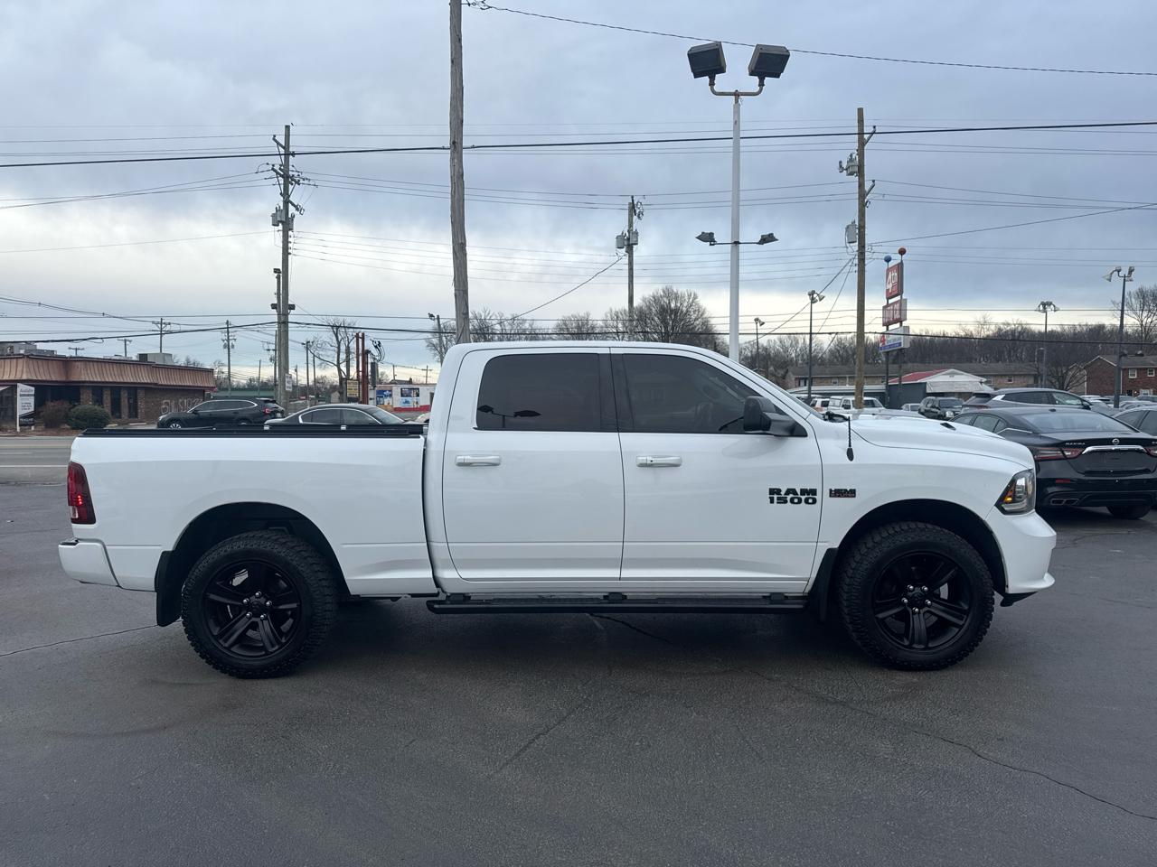 RAM 1500 4WD Crew Cab 149" Sport 2018