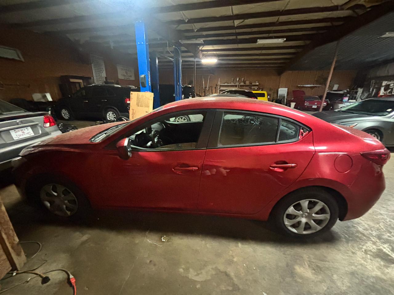 2015 Mazda MAZDA3 4dr Sdn Auto i Sport