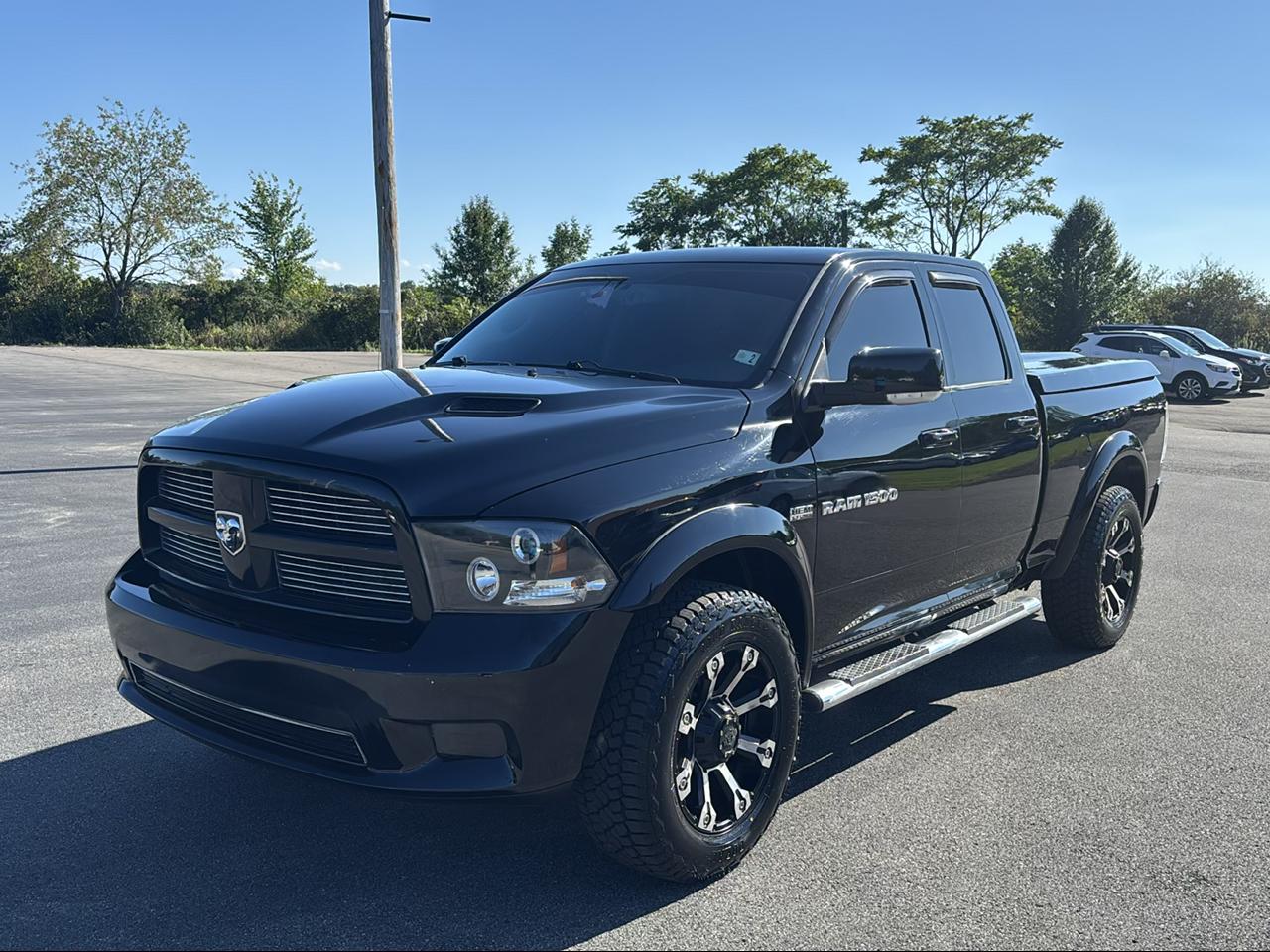 RAM 1500 4WD Quad Cab 140.5" Sport 2012