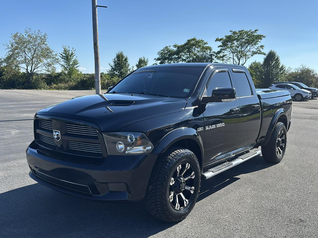 RAM 1500 4WD Quad Cab 140.5" Sport 2012
