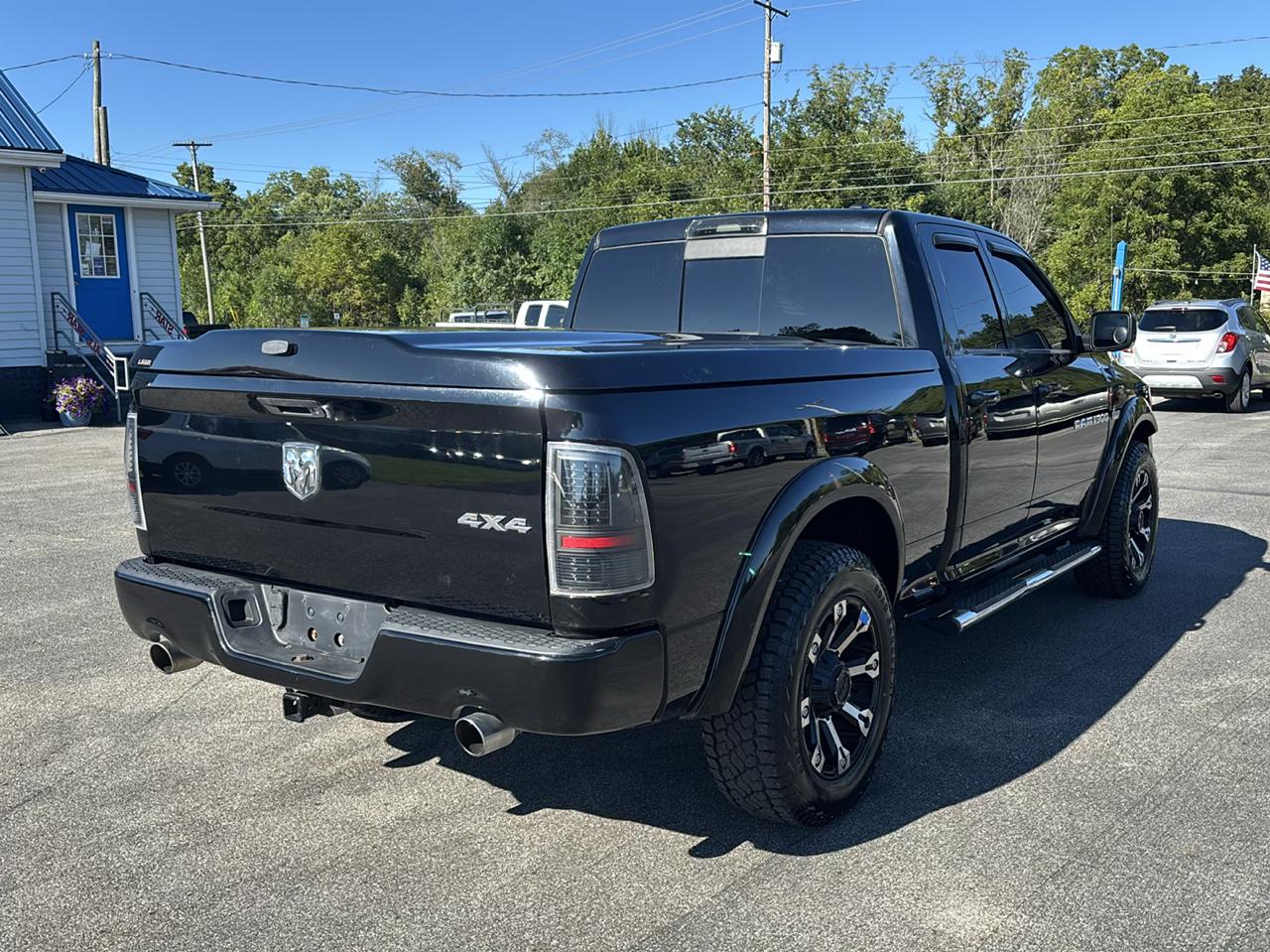RAM 1500 4WD Quad Cab 140.5" Sport 2012