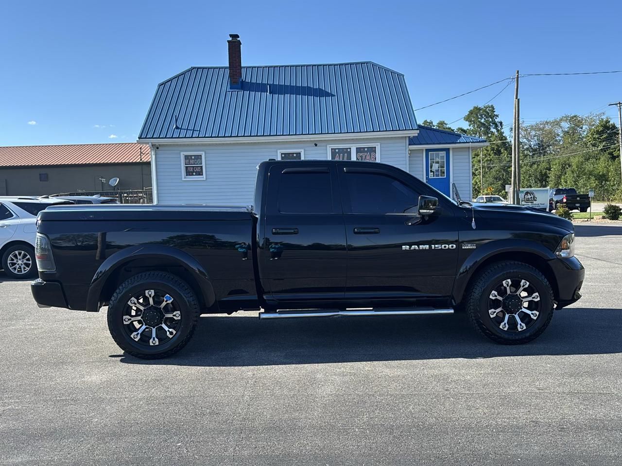 RAM 1500 4WD Quad Cab 140.5" Sport 2012