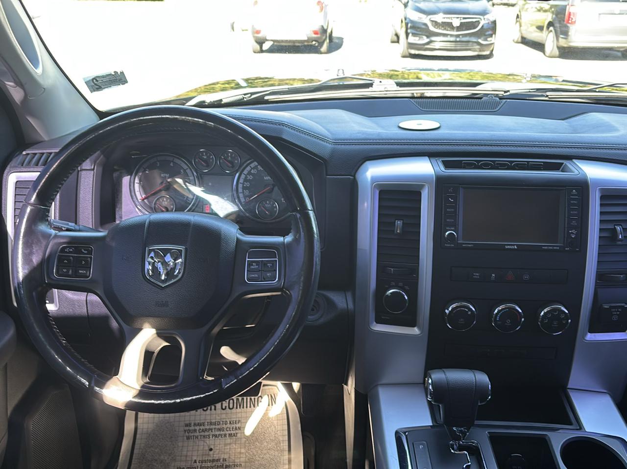 RAM 1500 4WD Quad Cab 140.5" Sport 2012