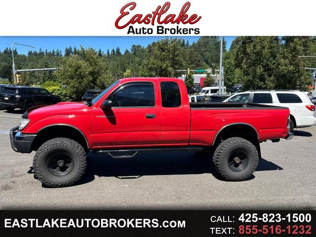 Red 2000 Toyota Tacoma 2 Dr V6 4WD Extended Cab Pickup Truck Four-Wheel Drive Automatic