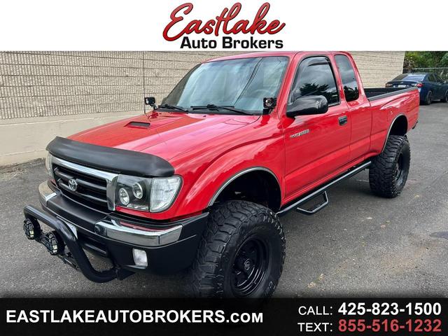 Red 2000 Toyota Tacoma 2 Dr V6 4WD Extended Cab Pickup Truck Four-Wheel Drive Automatic