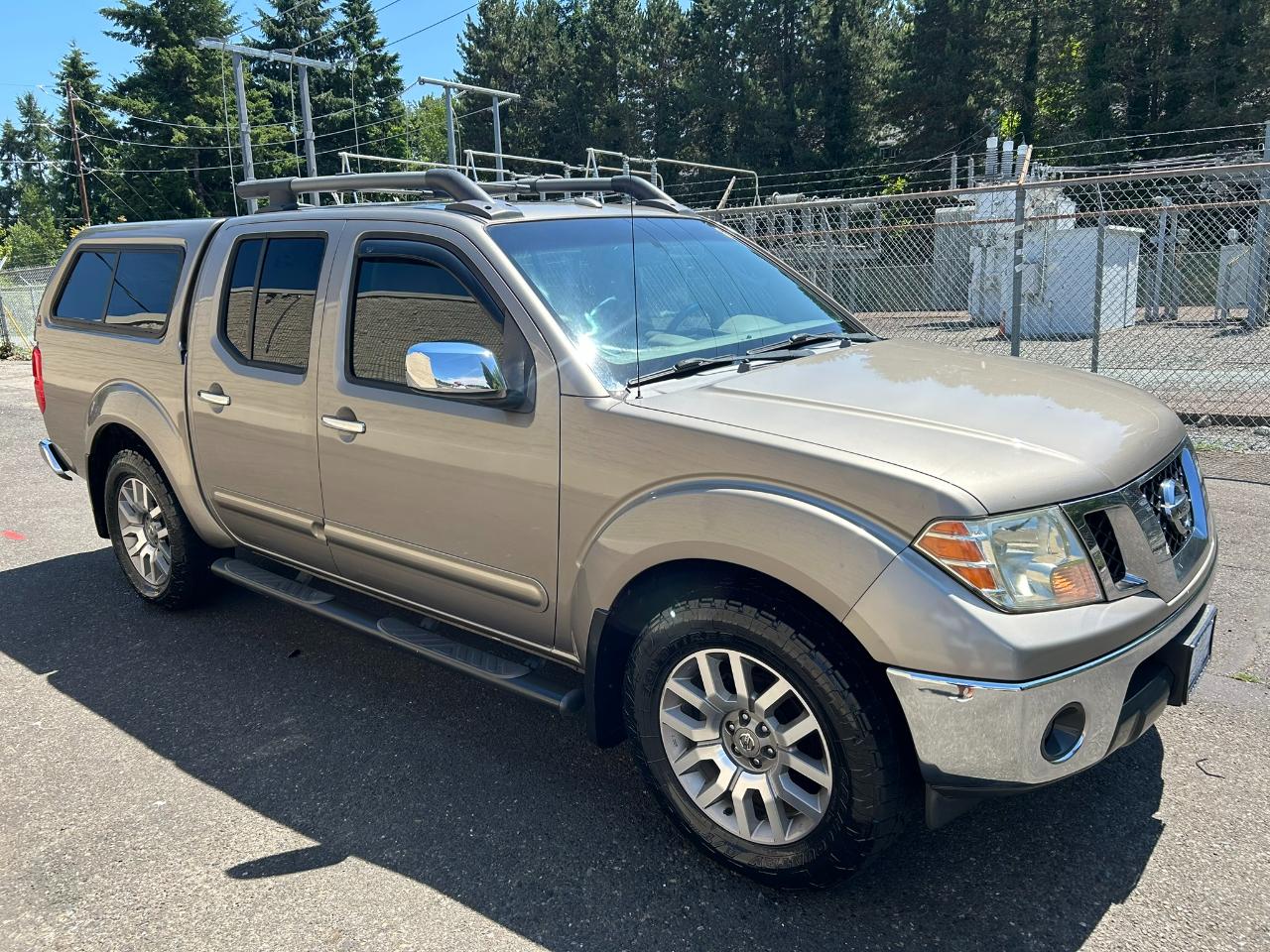 Nissan Frontier LE Crew Cab 4WD 2009