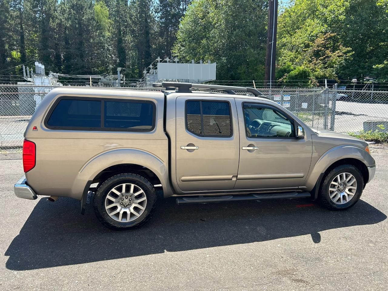 Nissan Frontier LE Crew Cab 4WD 2009