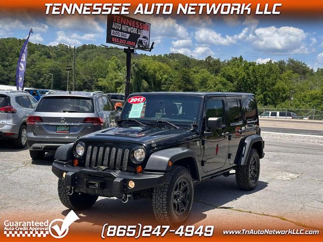 Black 2013 Jeep Wrangler Unlimited Sahara 4WD SUV / Crossover Four-Wheel Drive Automatic