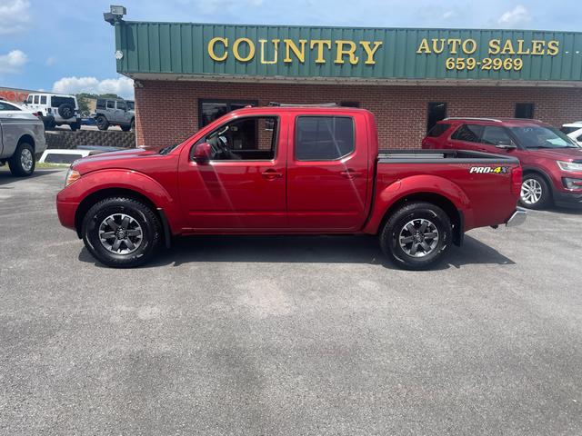 Bronze 2014 Nissan Frontier Pickup Truck Four-Wheel Drive Automatic