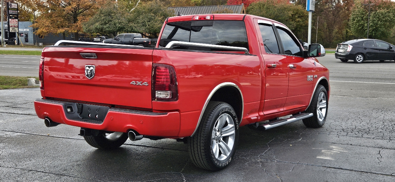 RAM 1500 4WD Quad Cab 140.5" Sport 2014
