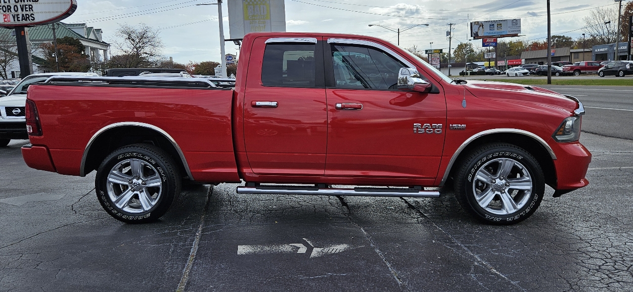 RAM 1500 4WD Quad Cab 140.5" Sport 2014