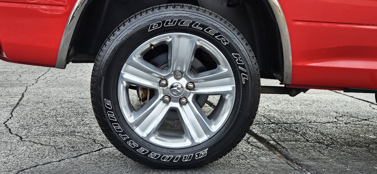 RAM 1500 4WD Quad Cab 140.5" Sport 2014