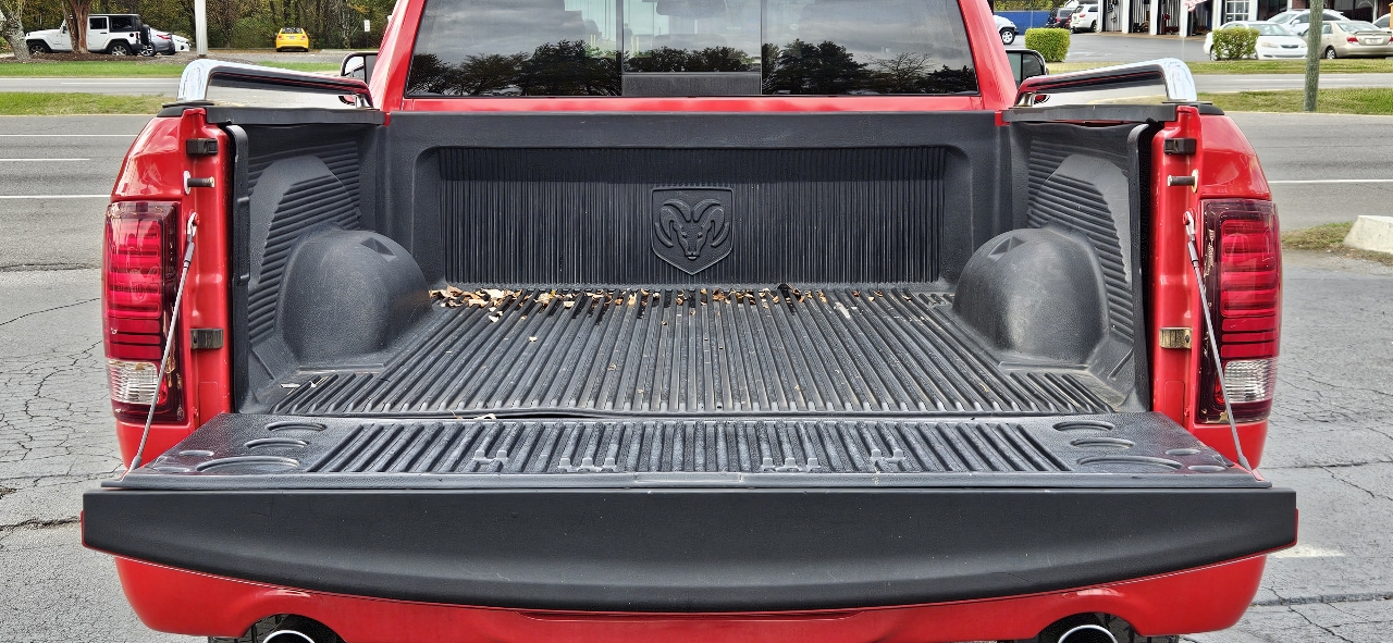 RAM 1500 4WD Quad Cab 140.5" Sport 2014