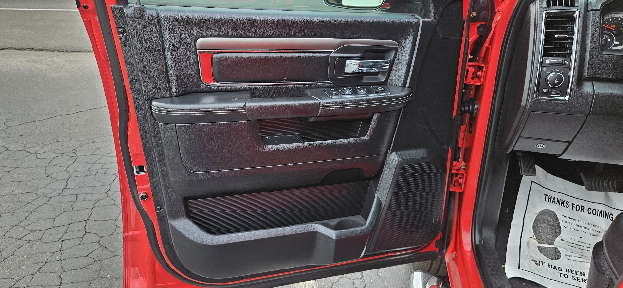 RAM 1500 4WD Quad Cab 140.5" Sport 2014