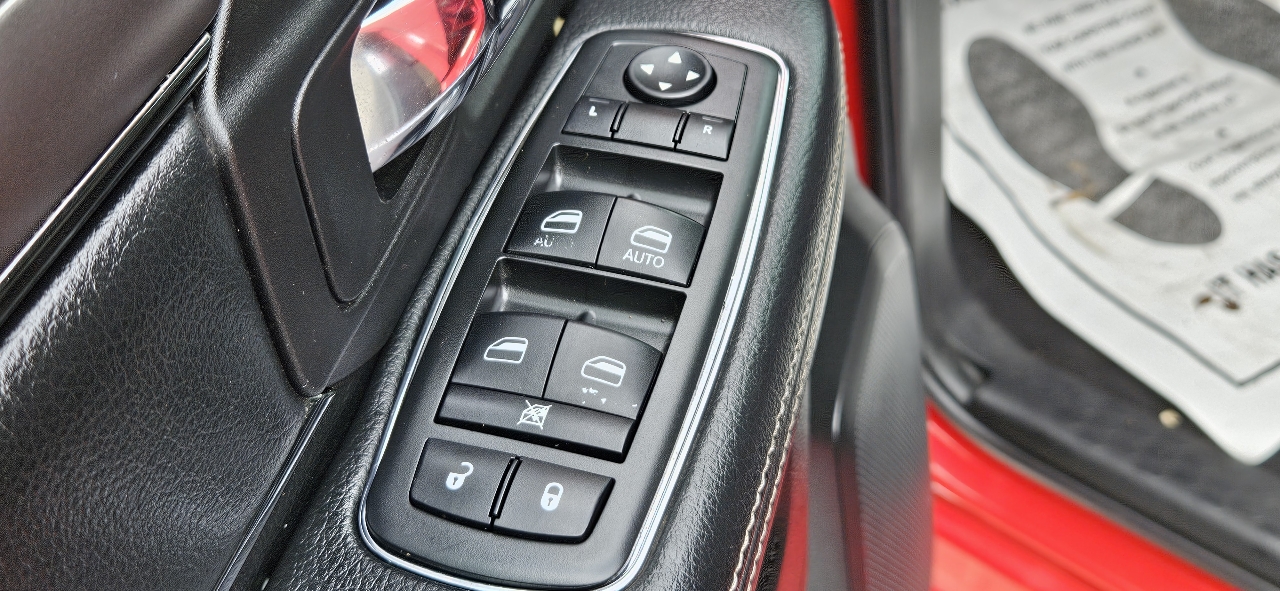 RAM 1500 4WD Quad Cab 140.5" Sport 2014