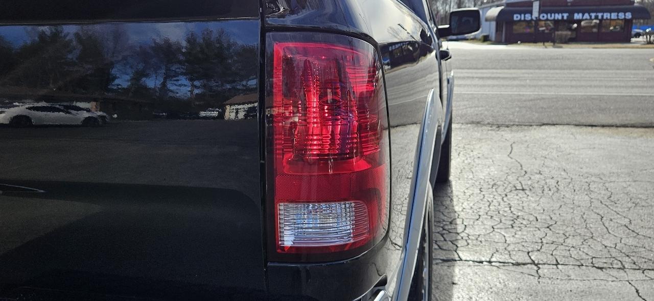 RAM 1500 2WD Quad Cab 140.5" Laramie 2012