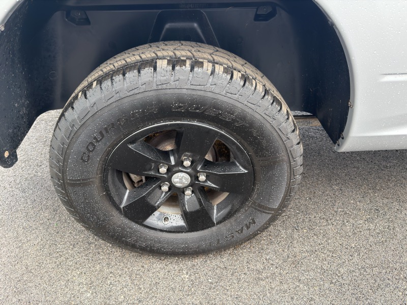 RAM 1500 4WD Quad Cab 140.5" SLT 2018