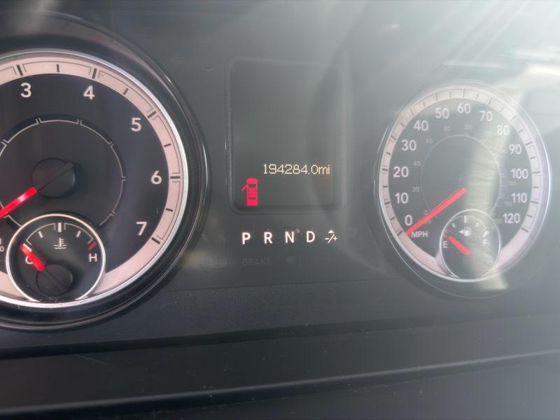 RAM 1500 4WD Quad Cab 140.5" SLT 2016