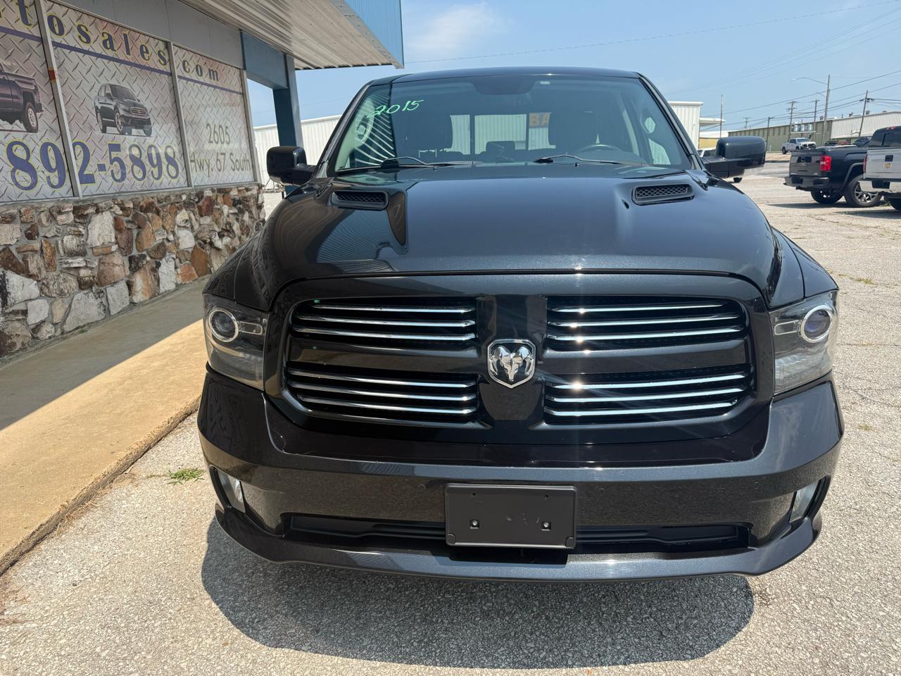 RAM 1500 4WD Quad Cab 140.5" Sport 2015