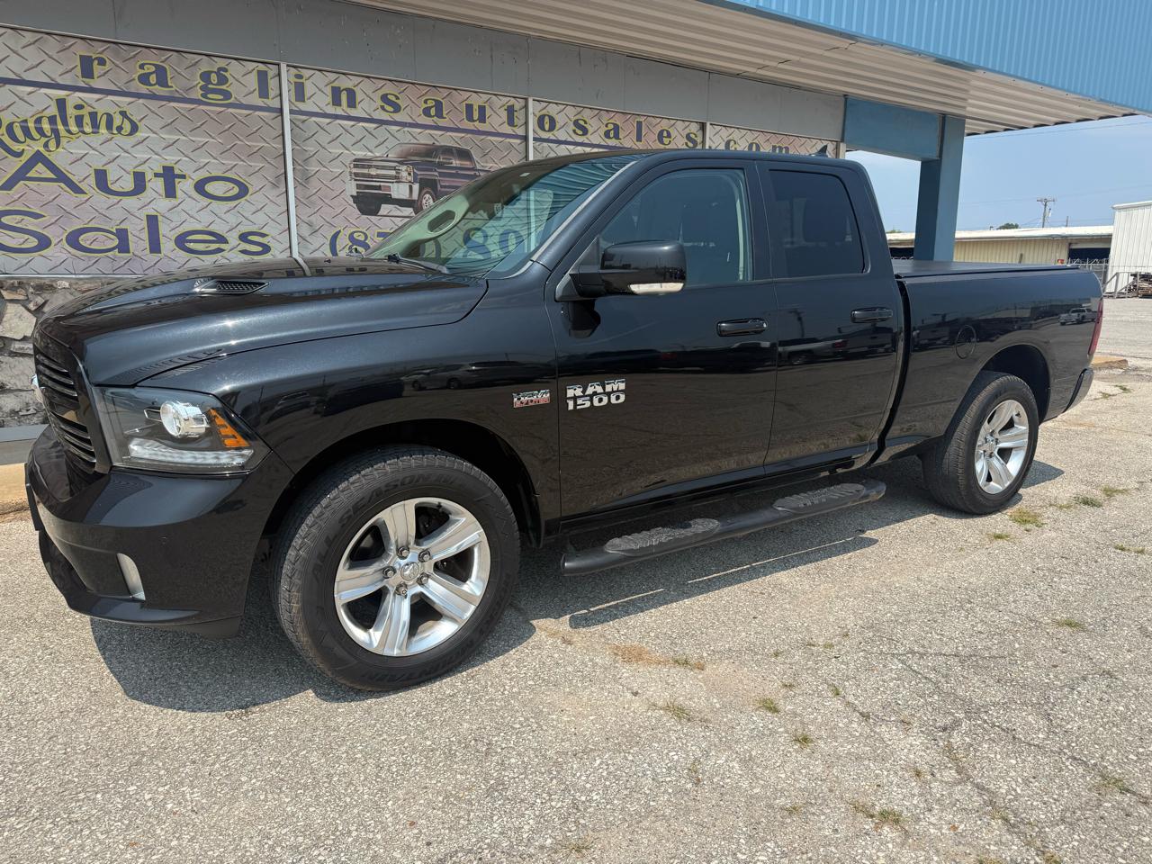 RAM 1500 4WD Quad Cab 140.5" Sport 2015