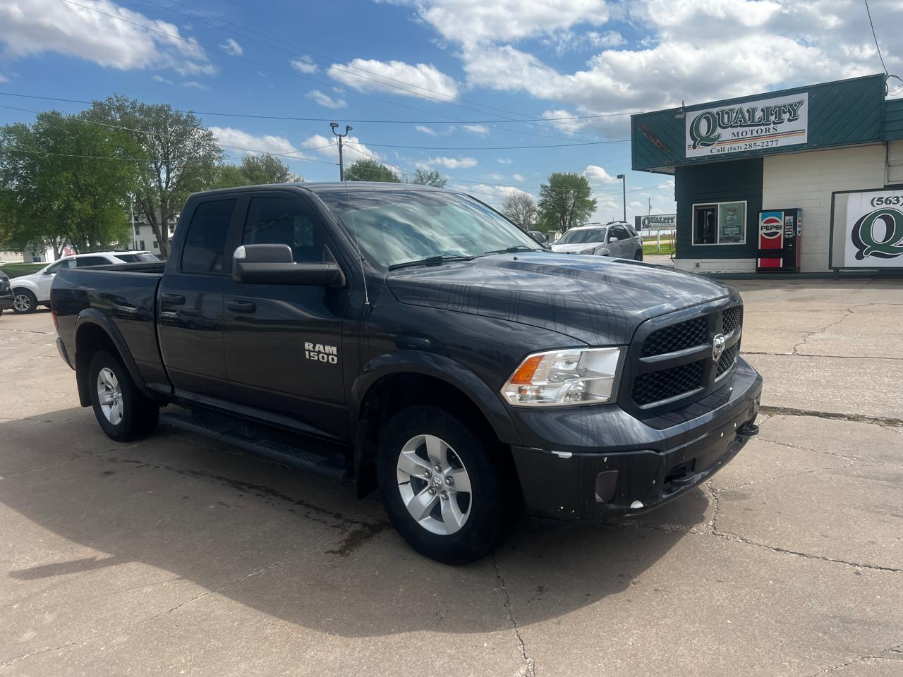 RAM 1500 4WD Quad Cab 140.5" Outdoorsman 2017