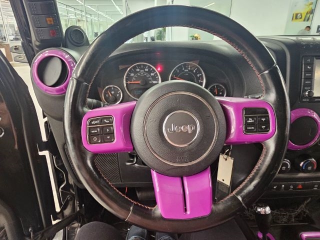 2012 Jeep Wrangler Unlimited Sahara Altitude photo 9