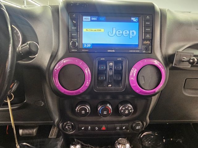 2012 Jeep Wrangler Unlimited Sahara Altitude photo 13