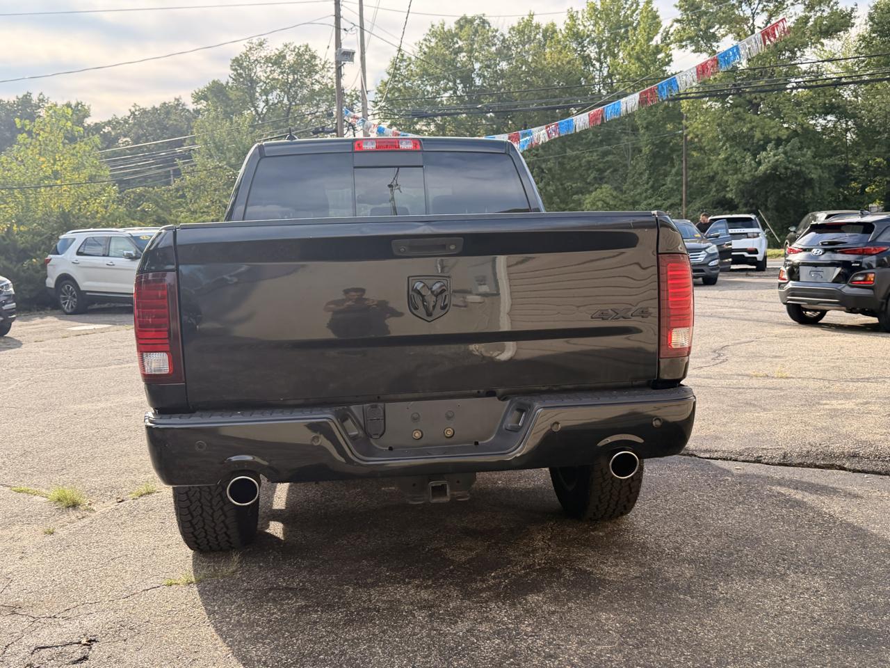 RAM 1500 4WD Crew Cab 140.5" Sport 2016