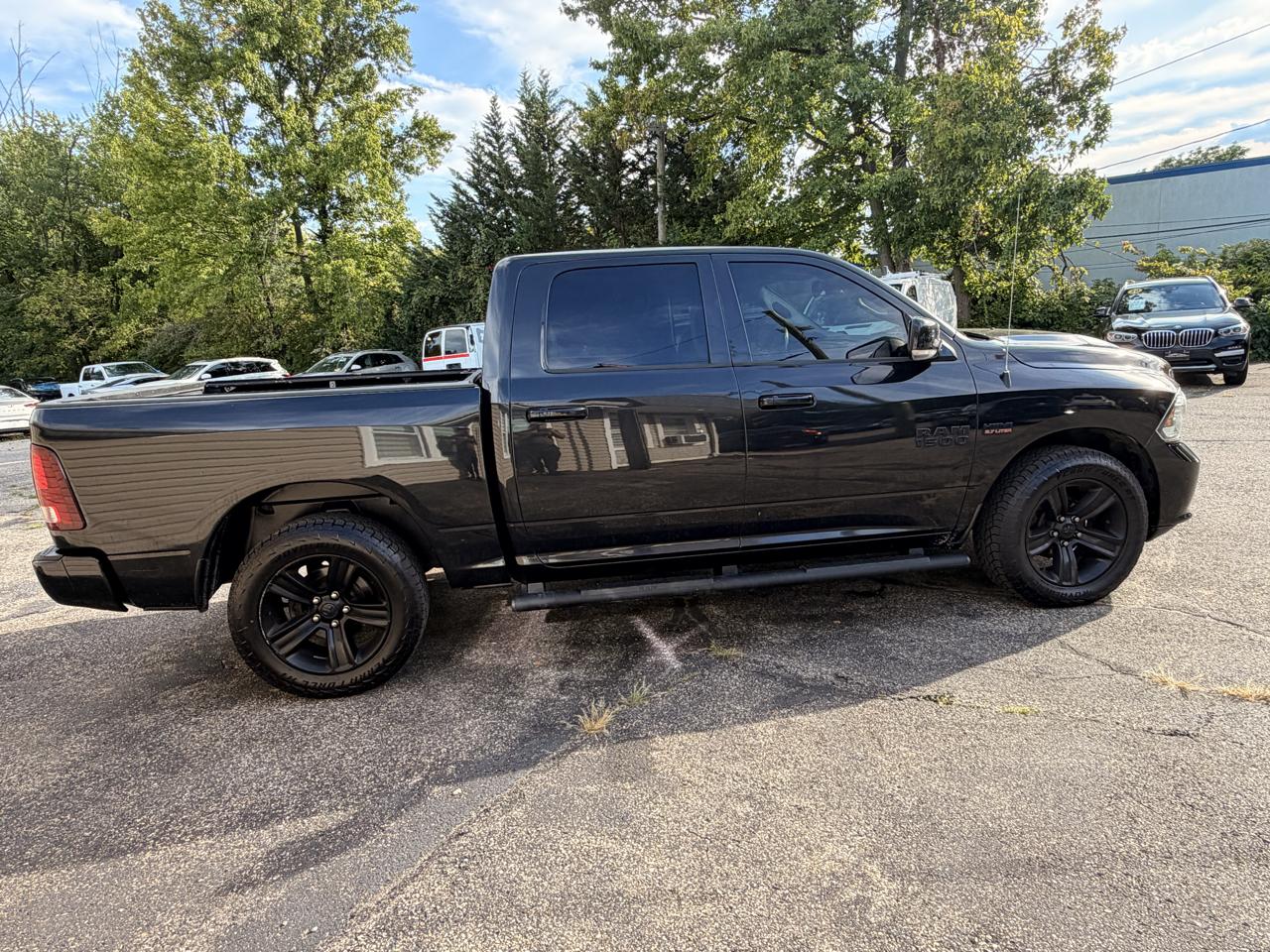RAM 1500 4WD Crew Cab 140.5" Sport 2016