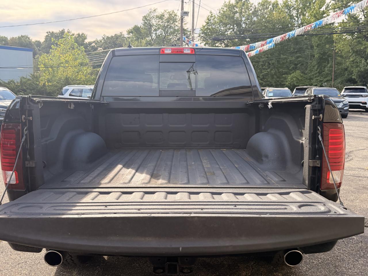 RAM 1500 4WD Crew Cab 140.5" Sport 2016