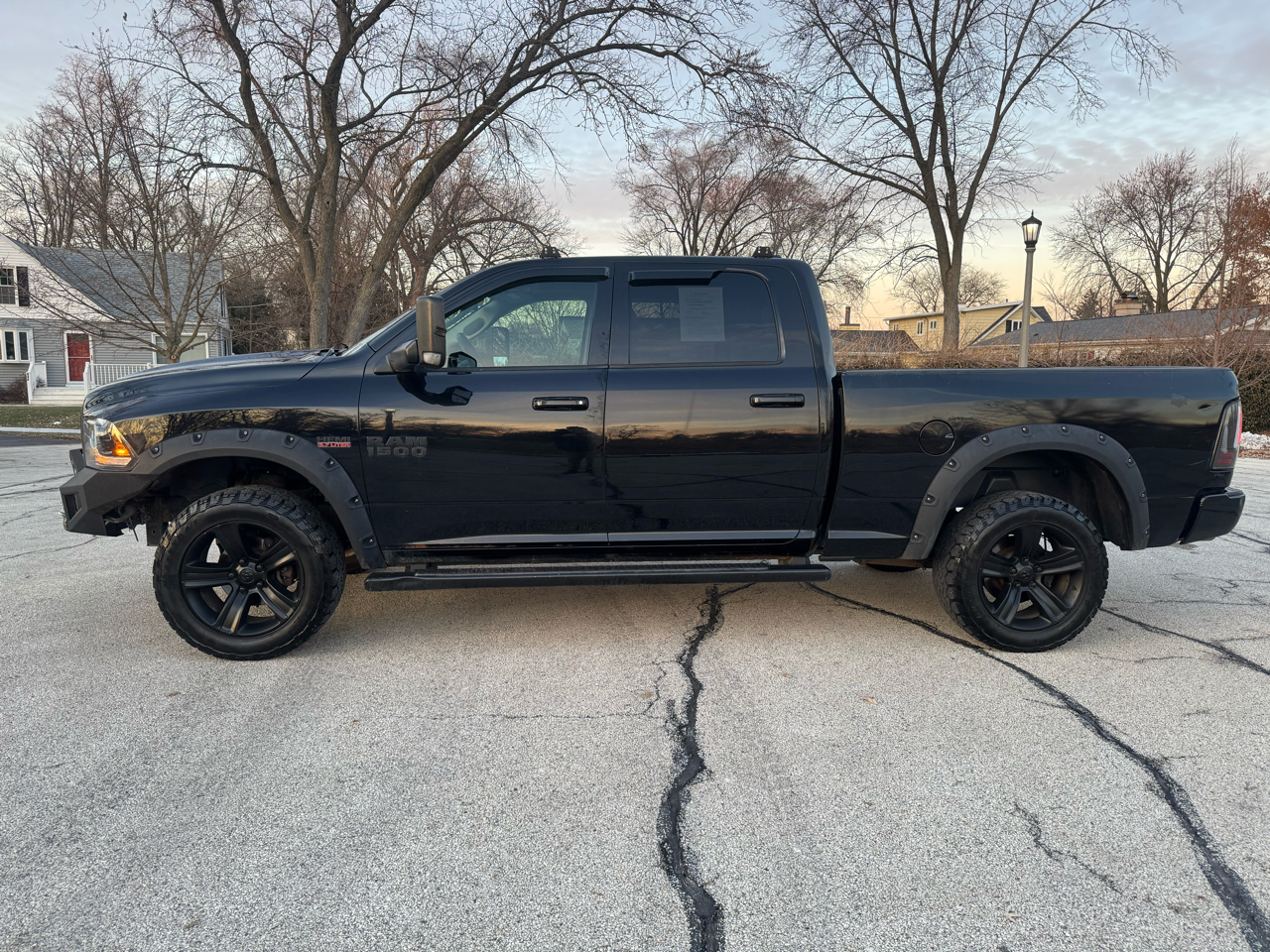 RAM 1500 4WD Crew Cab 149" Sport 2014