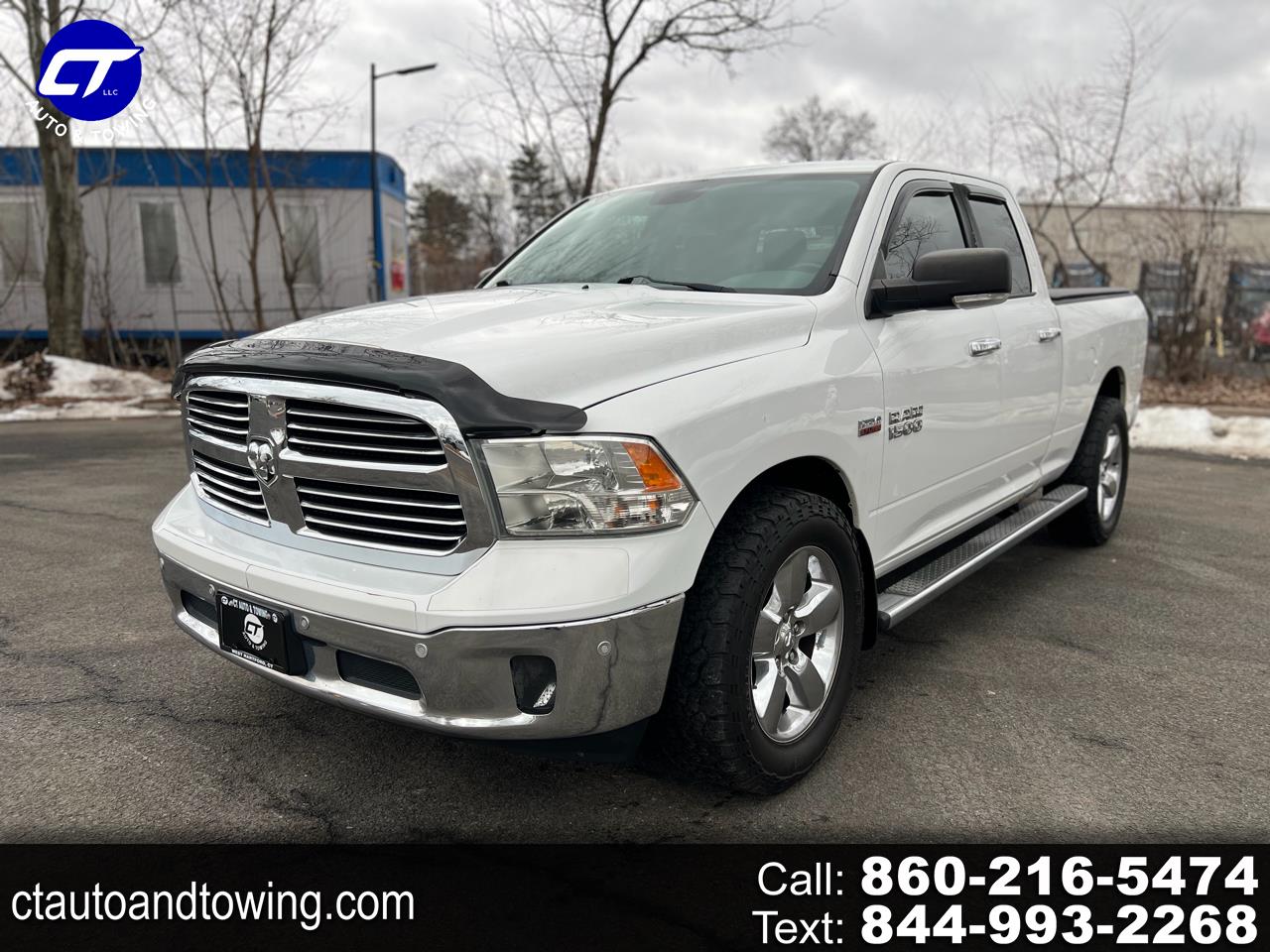 2014 RAM 1500 4WD Quad Cab 140.5" SLT