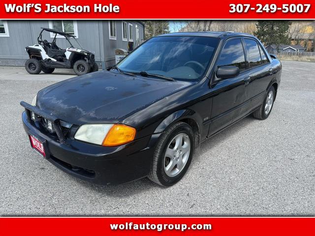 Black 2000 Mazda Protege ES Sedan Front-Wheel Drive 4-Speed Manual
