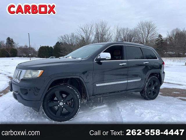 Black 2013 Jeep Grand Cherokee Overland 4WD SUV / Crossover Four-Wheel Drive 5-Speed Automatic