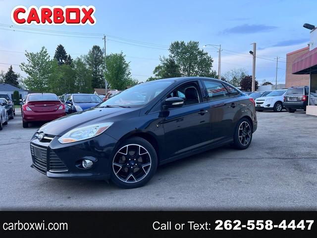Black 2014 Ford Focus SE Sedan Front-Wheel Drive 6-Speed Automatic