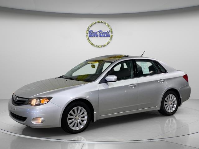 Silver 2011 Subaru Impreza Sedan All-Wheel Drive Automatic