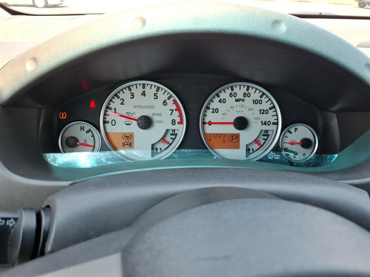 Nissan Frontier LE Crew Cab 4WD 2010
