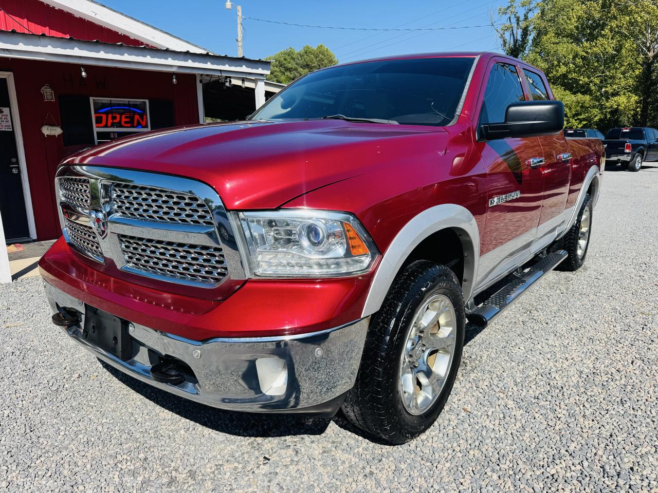 RAM 1500 4WD Quad Cab 140.5" Laramie 2014
