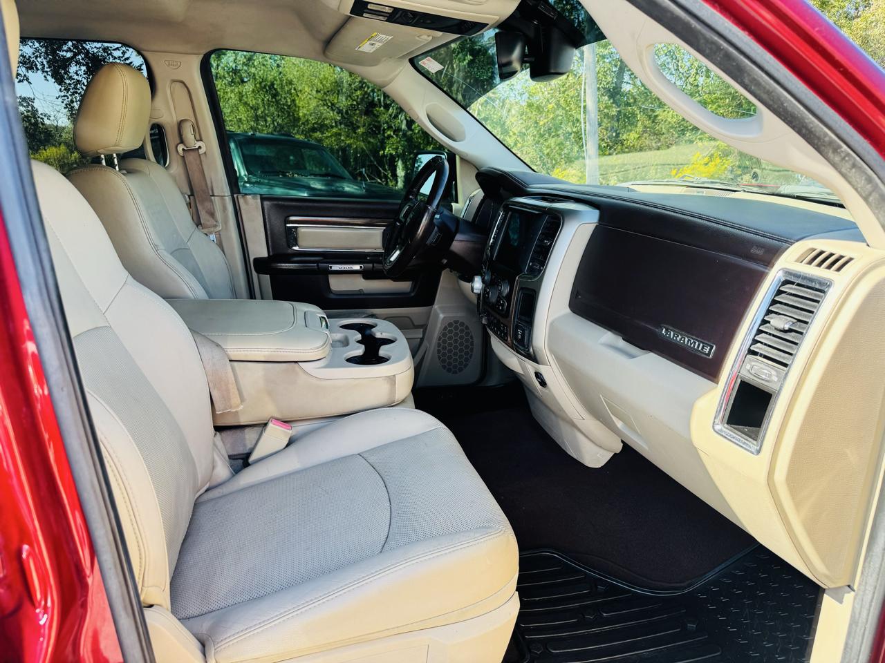 RAM 1500 4WD Quad Cab 140.5" Laramie 2014