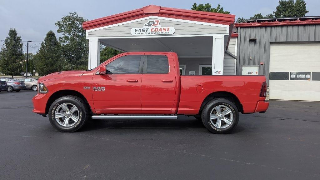 RAM 1500 4WD Quad Cab 140.5" Sport 2013