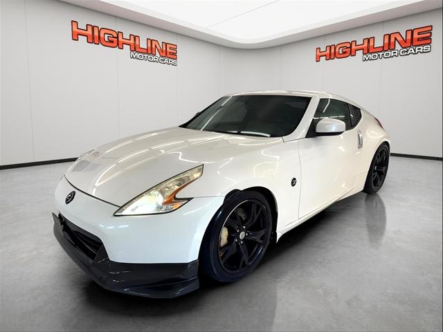 White 2009 Nissan 370Z Touring Coupe Rear-Wheel Drive 6-Speed Automatic