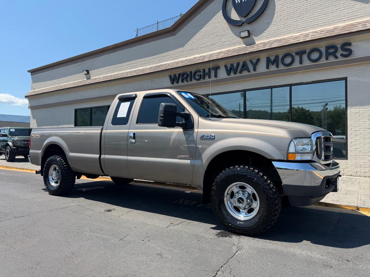 2004 Ford F-250 Lariat 4x4 SuperCab SWB's photo
