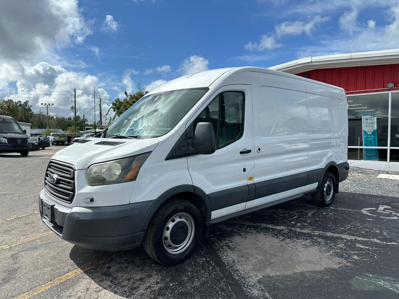 Ford Transit 150 Van Med. Roof w/Sliding Pass. 148-in. WB 2016