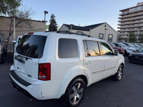 Honda Pilot 4WD 4dr Touring w/RES & Navi 2015