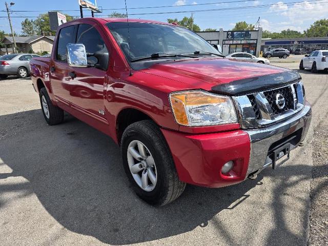 Red 2011 Nissan Titan Pickup Truck Four-Wheel Drive Automatic
