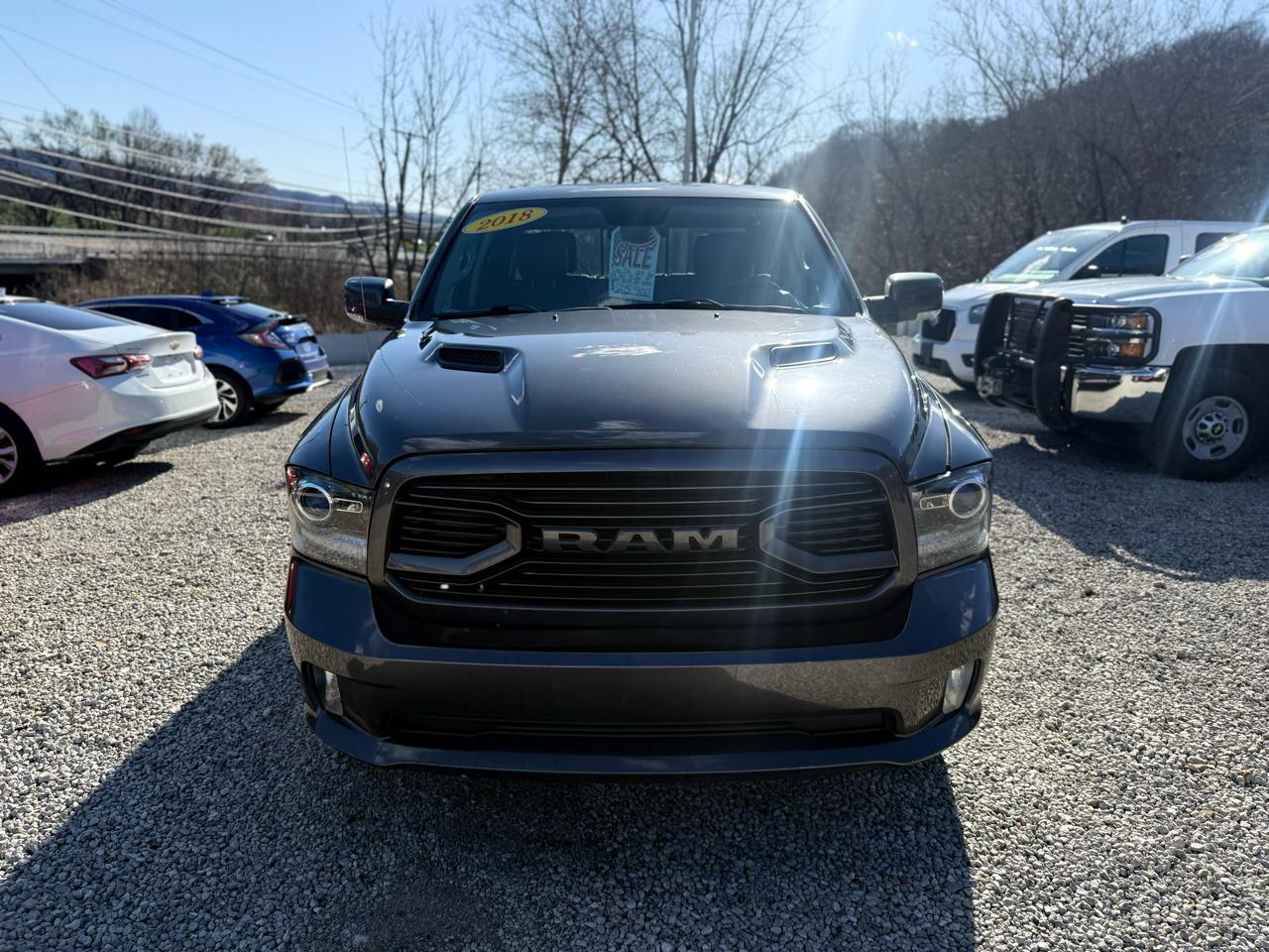 RAM 1500 4WD Crew Cab 140.5" Sport 2018