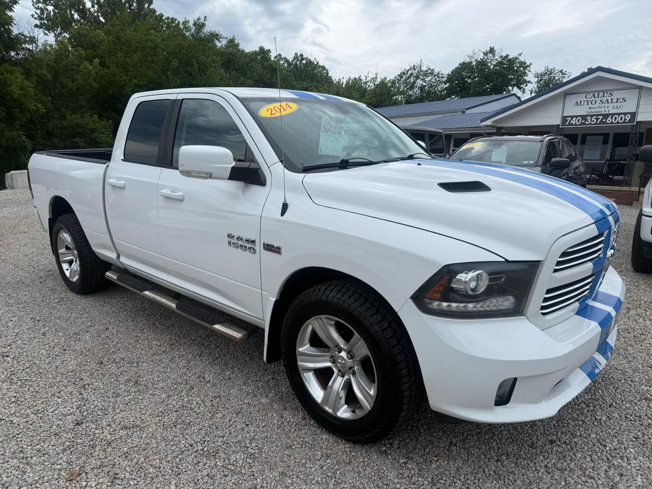 RAM 1500 4WD Quad Cab 140.5" Sport 2014