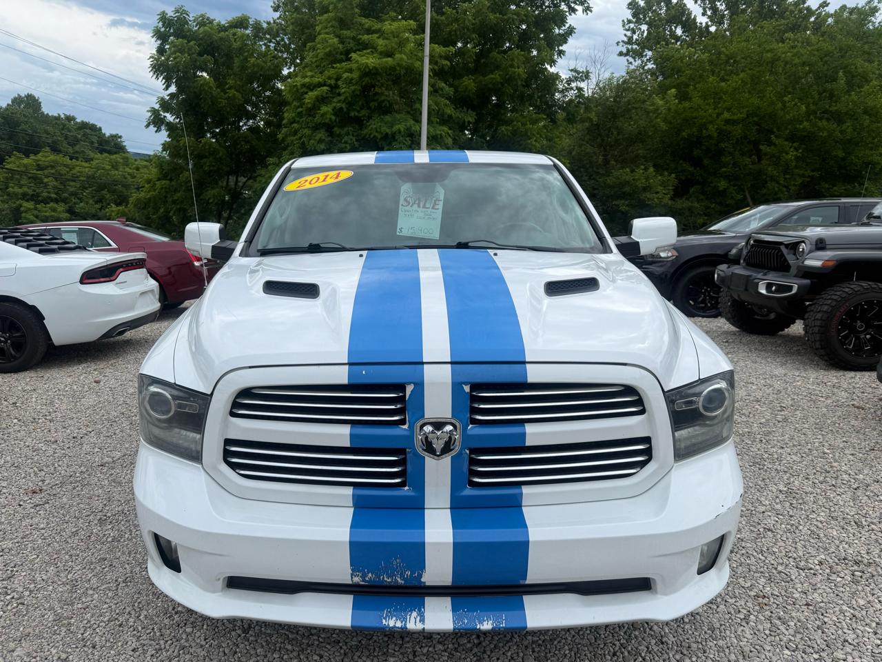 RAM 1500 4WD Quad Cab 140.5" Sport 2014