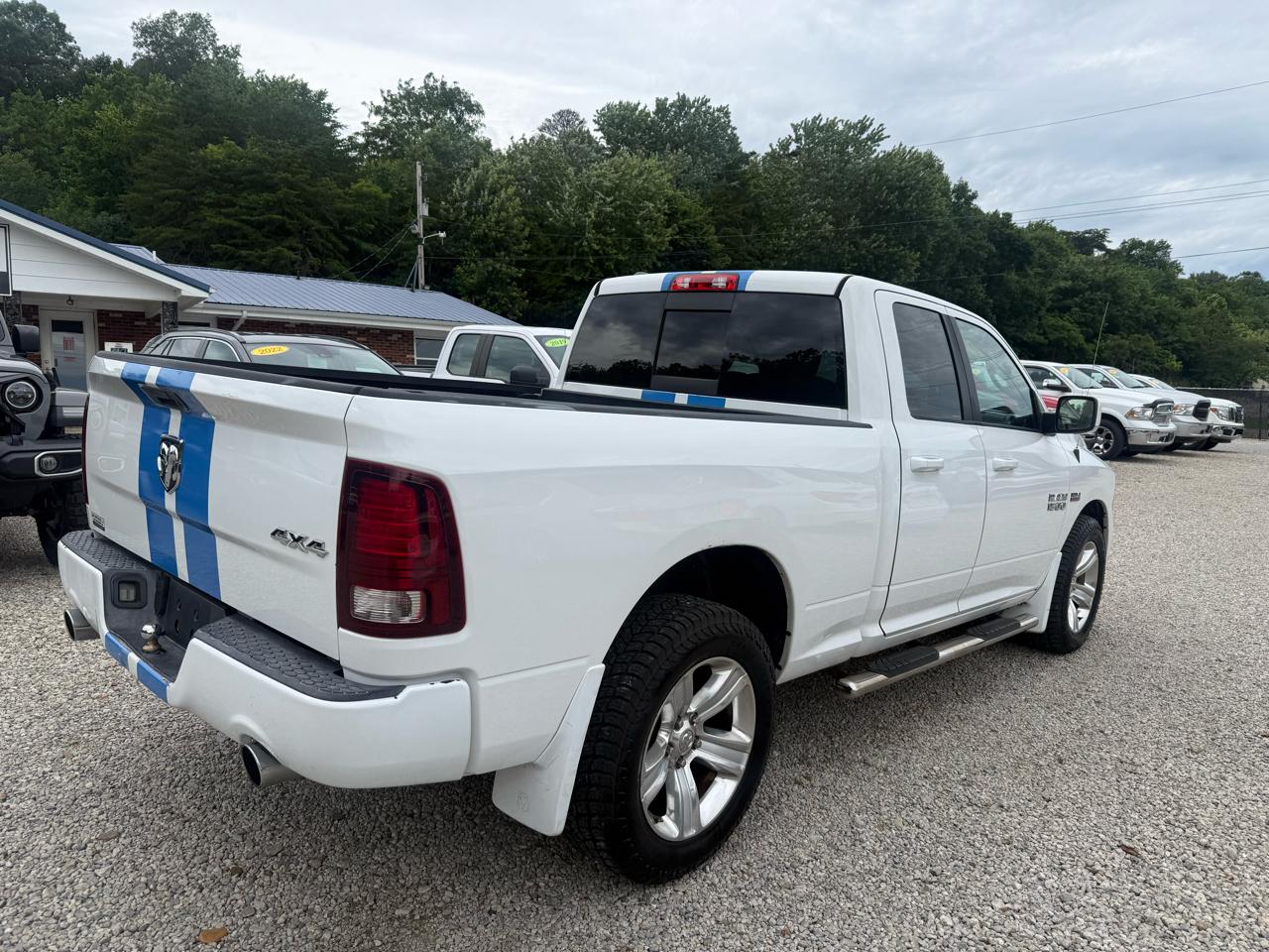 RAM 1500 4WD Quad Cab 140.5" Sport 2014